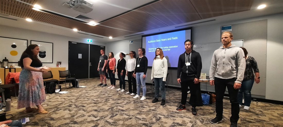 Lauren teaching a group during a live training