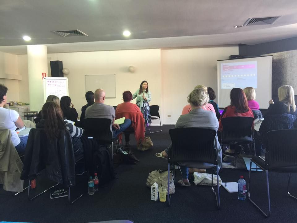 Lauren teaching a live training group